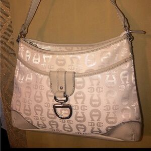 Etienne Aigner Vintage Champagne/Beige Monogram Logo Canvas Purse Hobo Bag.